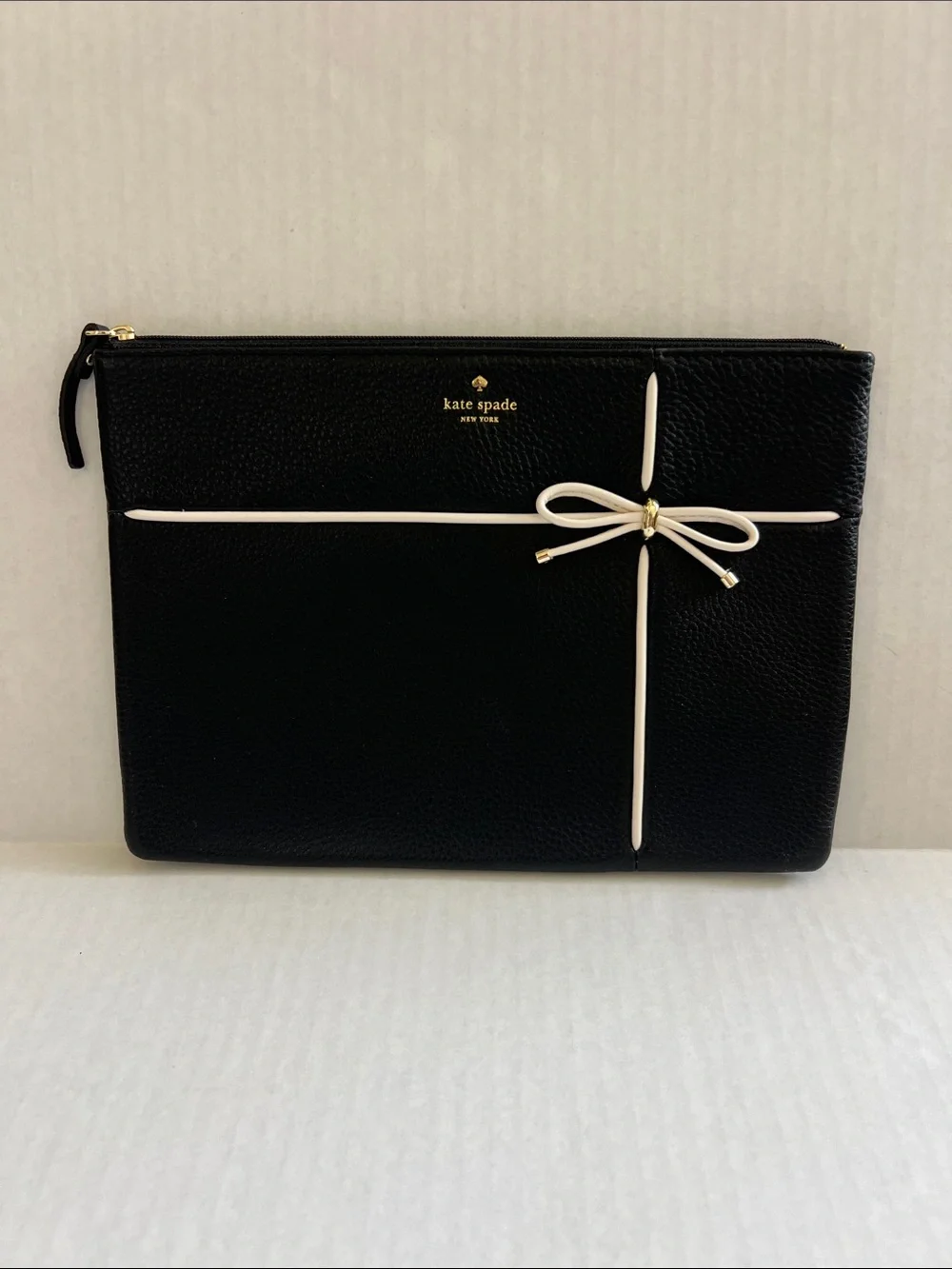Kate Spade Black Pebbled Leather Cherry Street Gia Clutch with Cream Bow Accent
